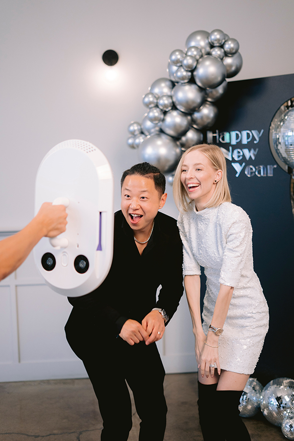Guests striking a pose at the Salsa booth
